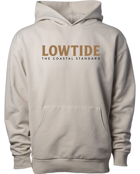 Beige hoodie with 'LOWTIDE THE COASTAL STANDARD' text on a white background