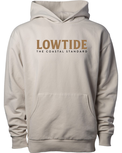Beige hoodie with 'LOWTIDE THE COASTAL STANDARD' text on a white background